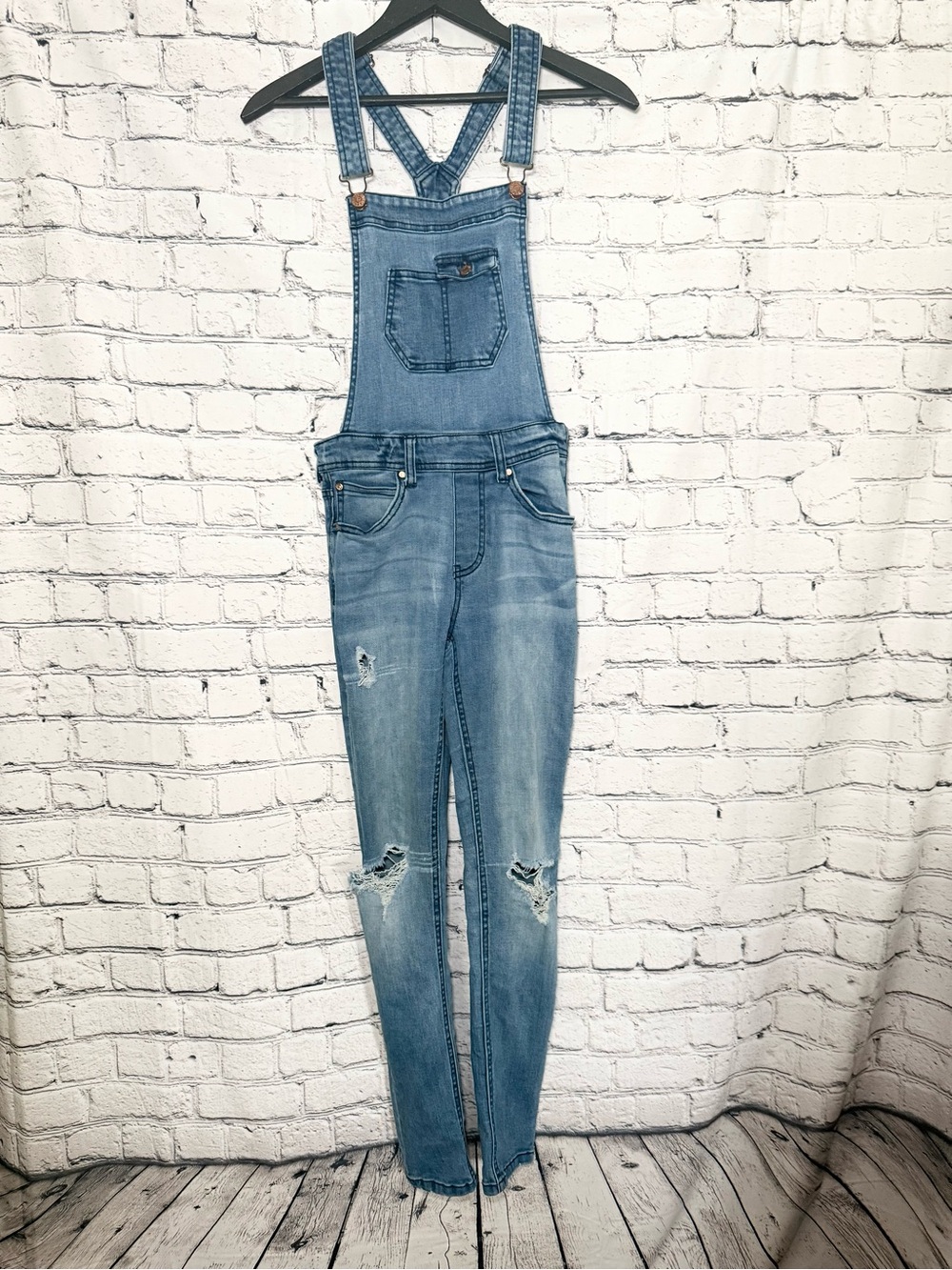 Light Blue Distressed Denim Overalls. Size 0